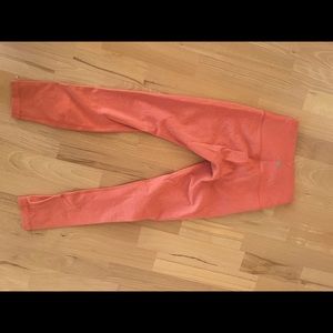 Lululemon Wunder Under high waisted tights. Sz 4-Orange with subtle tonal print
